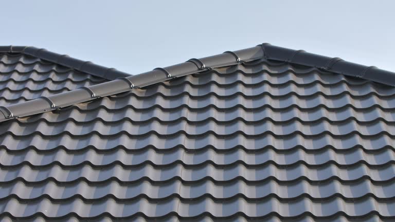modern roof made of metal tiles close up, shooting with a slider
